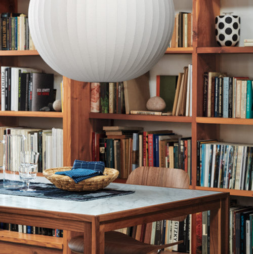 Dining room setting featuring Nelson Ball Bubble ceiling pendant