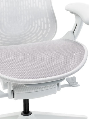 Close-up of a white Mirra 2 office chair by Herman Miller, showing the breathable suspension seat.