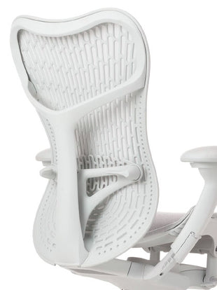 Rear view of a white Herman Miller Mirra 2 office chair, showing the back support.