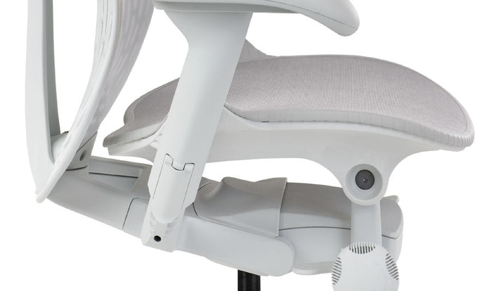 Side view of a white Mirra 2 office chair by Herman Miller, showing the tilt feature.