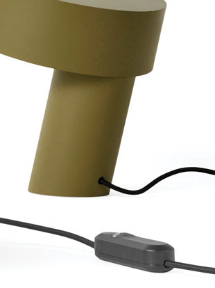 A green Slant lamp by HAY, showing the stepless in-line dimmer switch.