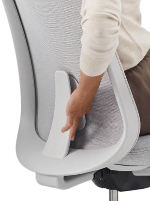 Rear view of a Herman Miller Lino office chair, showing the adjustable back support.