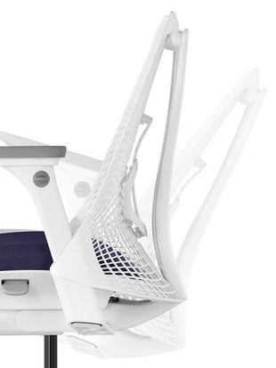 Side view of a white Sayl office chair by Herman Miller, showing the tilt feature.