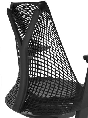 Rear view of a black Sayl office chair by Herman Miller, showing the Y-shaped back support.