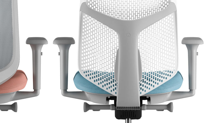 Rear view of a grey and blue Verus office chair by Herman Miller, showing the Triflex back.