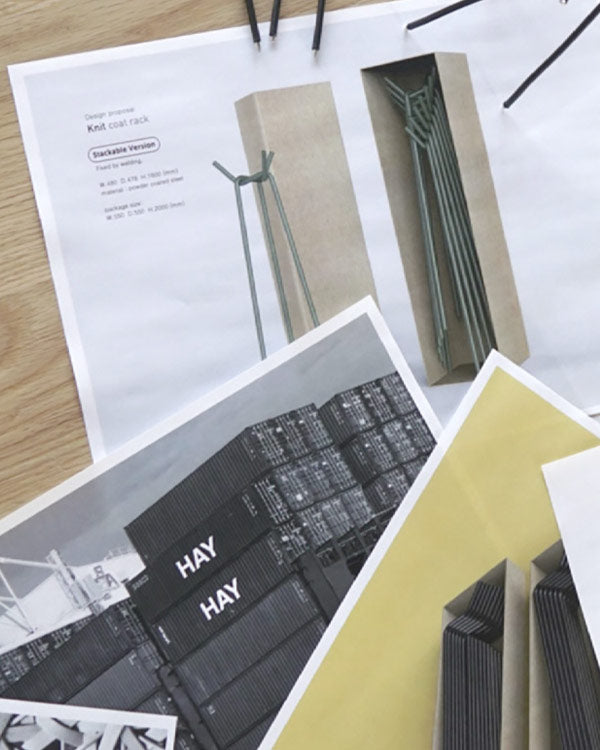 Close-up of assembly instructions for a Knit coat rack by HAY.