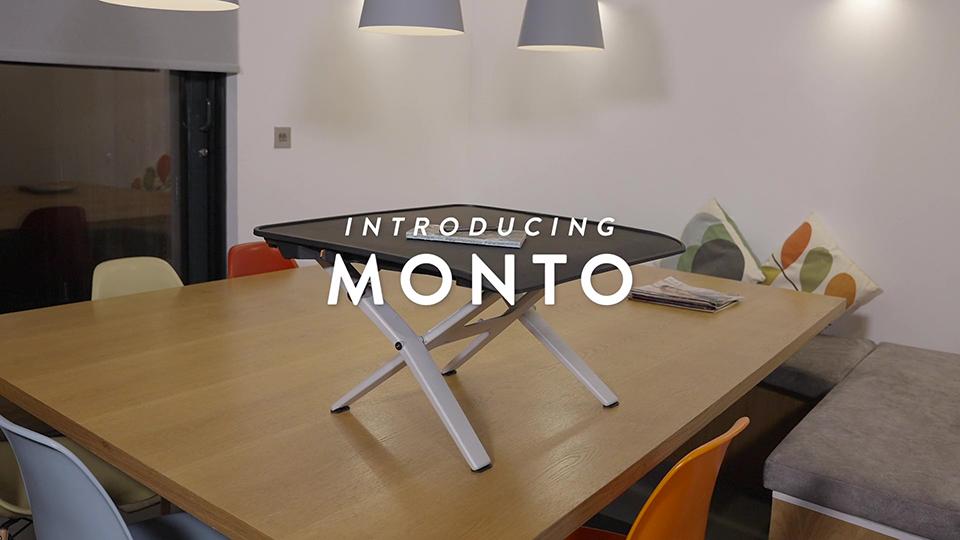 A video of people using a Monto sit stand by CBS, showing how it can transported and used on any desk to transform it into a standing desk.