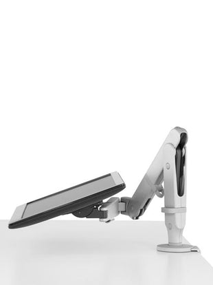 Side view of a white Ollin monitor arm by CBS, showing the backward tilt that allows the monitor to be used as a touch-screen.