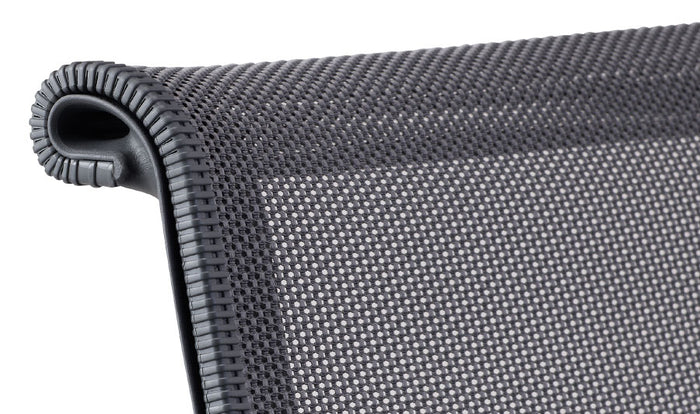 Close-up of a grey Setu office chair by Herman Miller, showing the breathable intercept suspension back.
