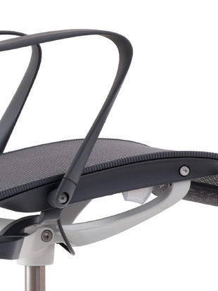 Close-up side view of a grey Setu office chair by Herman Miller, showing the height adjustment lever.