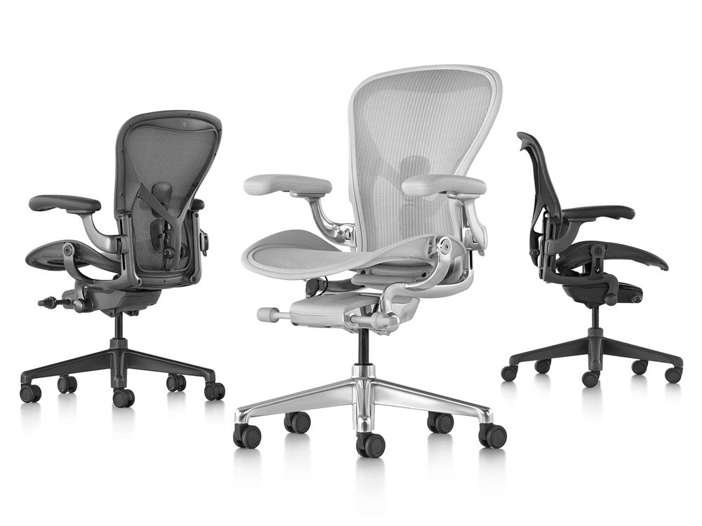 Herman Miller Aeron line up featuring graphite, mineral white and onyx black each at different angle