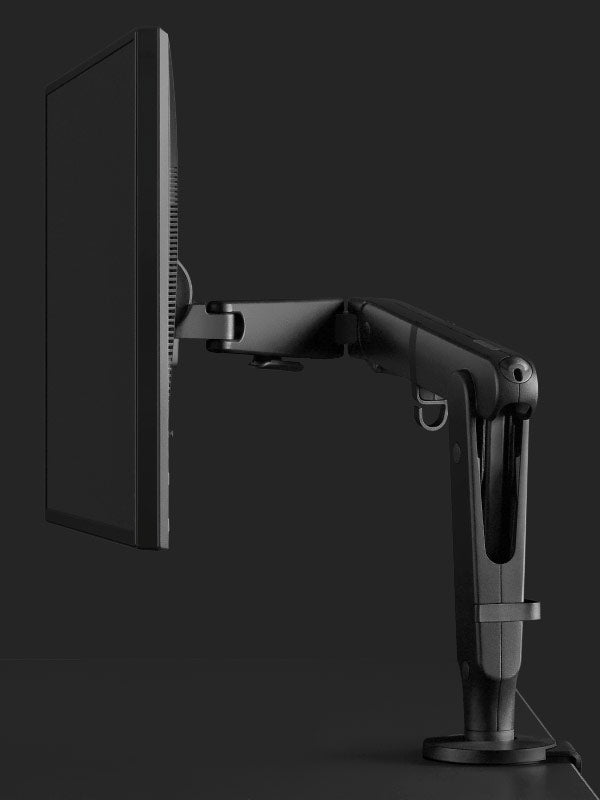 Side view of a black Ollin gaming monitor arm by Herman Miller.