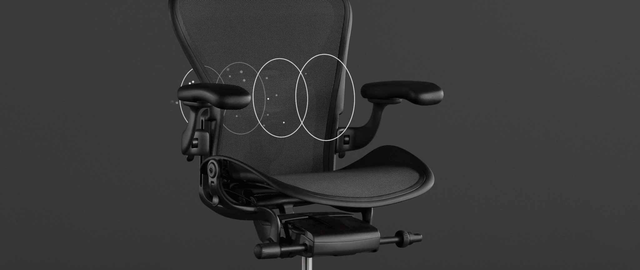 Font view of a black Aeron gaming chair by Herman Miller, overlaid with white graphics highlighting the 8Z Pillicle material.
