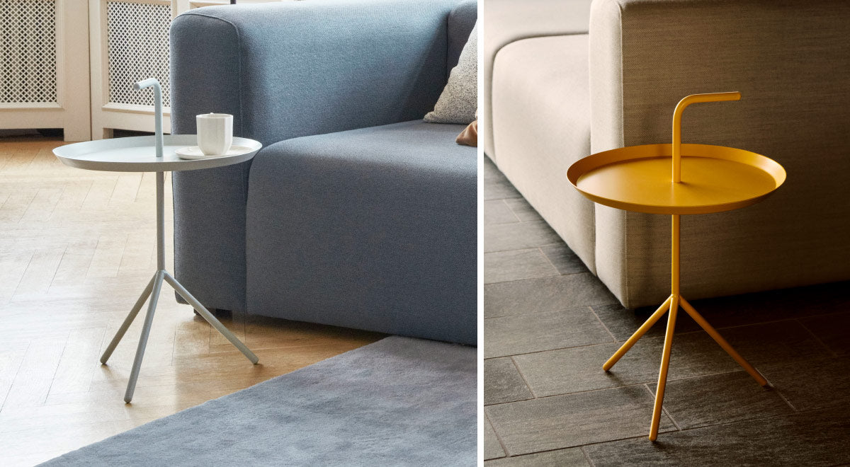 A collage of two images showing two DLM side tables by HAY, one white and one yellow. Set in a home environment next to a sofa.