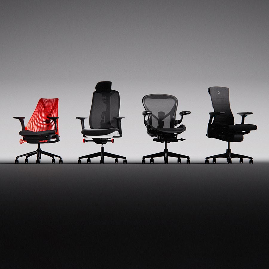 Four Herman Miller gaming chairs lined up on grey background includes Sayl in red and black, Vantum in Polor white and black, Aeron onyx black and Embody black.