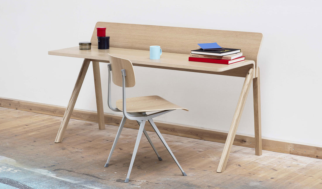Two images of HAY's vinyl-topped oak desk, the CPH90, as part of a warm home office.
