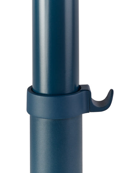 Close-up of a blue Passport table by Herman Miller, showing the optional bag book.