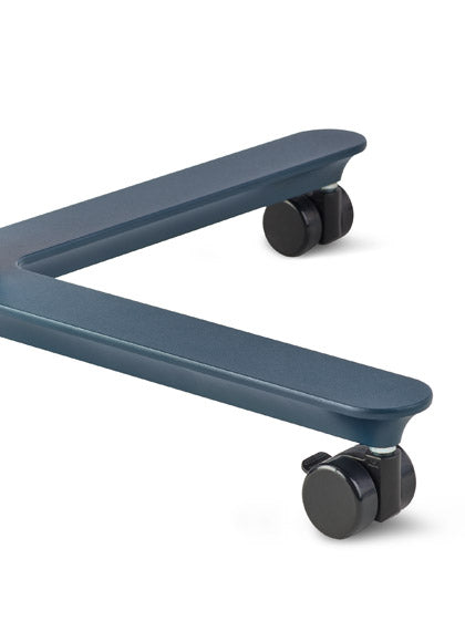 Close-up of a blue Passport table by Herman Miller, showing the black locking wheels.