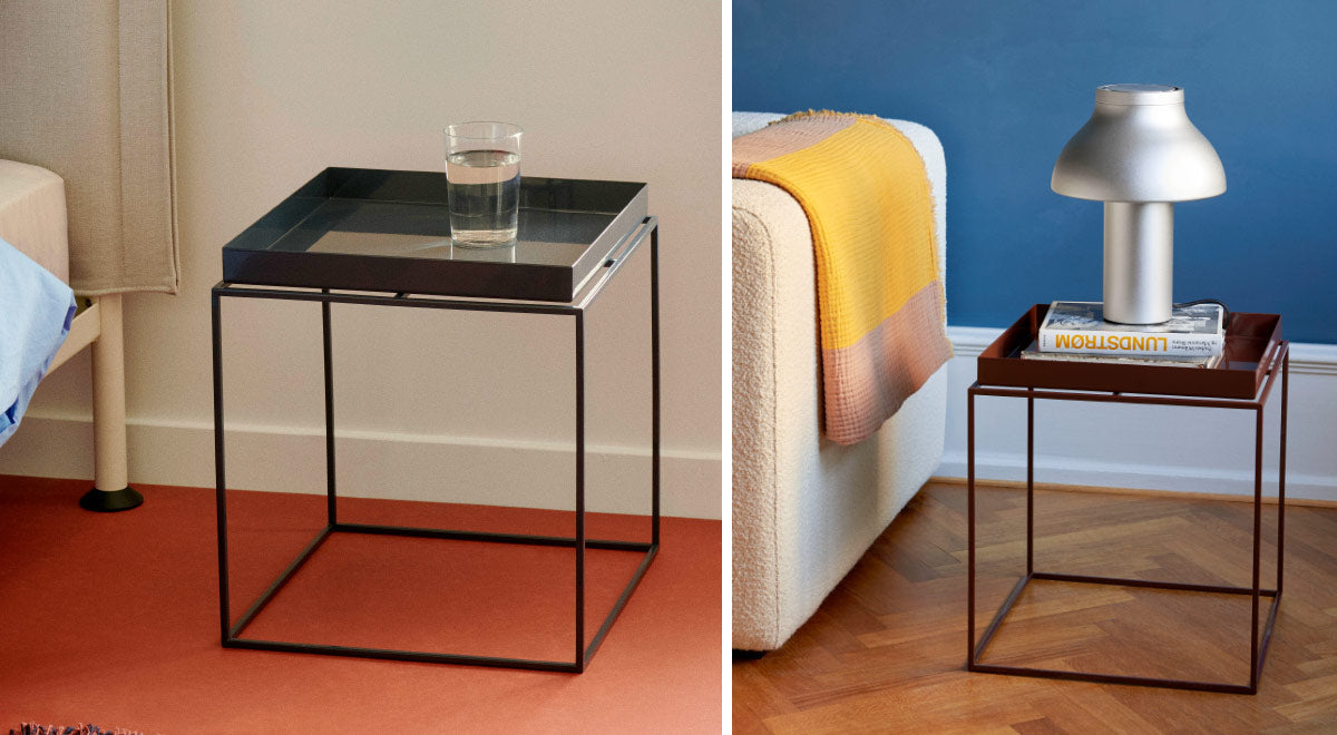 A collage of two images featuring a black and chocolate Tray table by HAY. One is set in a bedroom and the other is in a living room with a silver PC Portable table lamp by HAY.